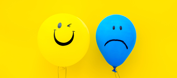 Looping gif of a multi-color banded cone made up of particles. 